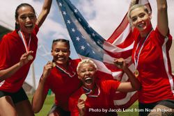 Woman soccer team celebrating championship victory 5Rro15