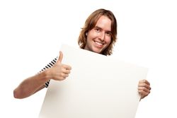 Smiling Young Man with Thumbs Up Holding Blank Sign