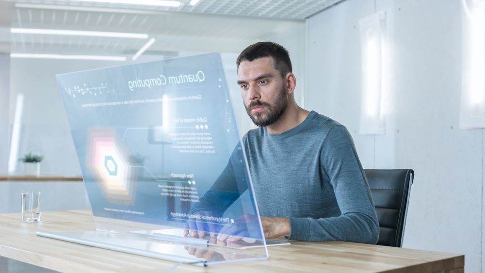 In the Near Future Professional Engineer Works on Transparent Computer Display