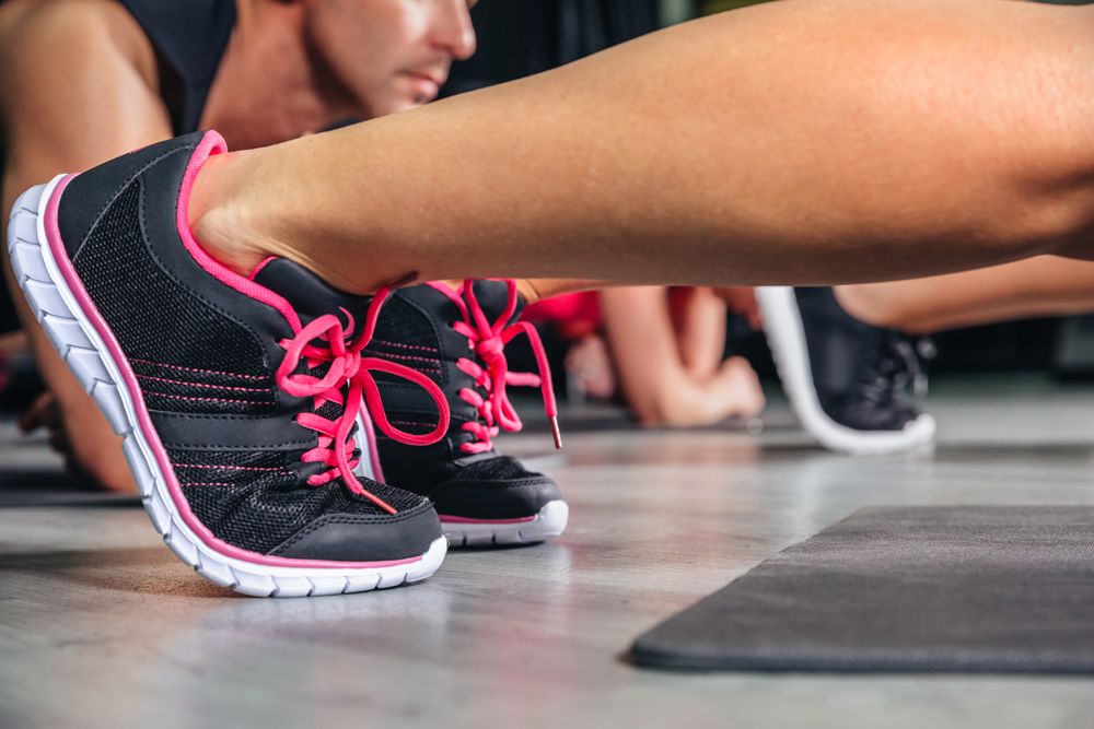 Shoes of woman in fitness class