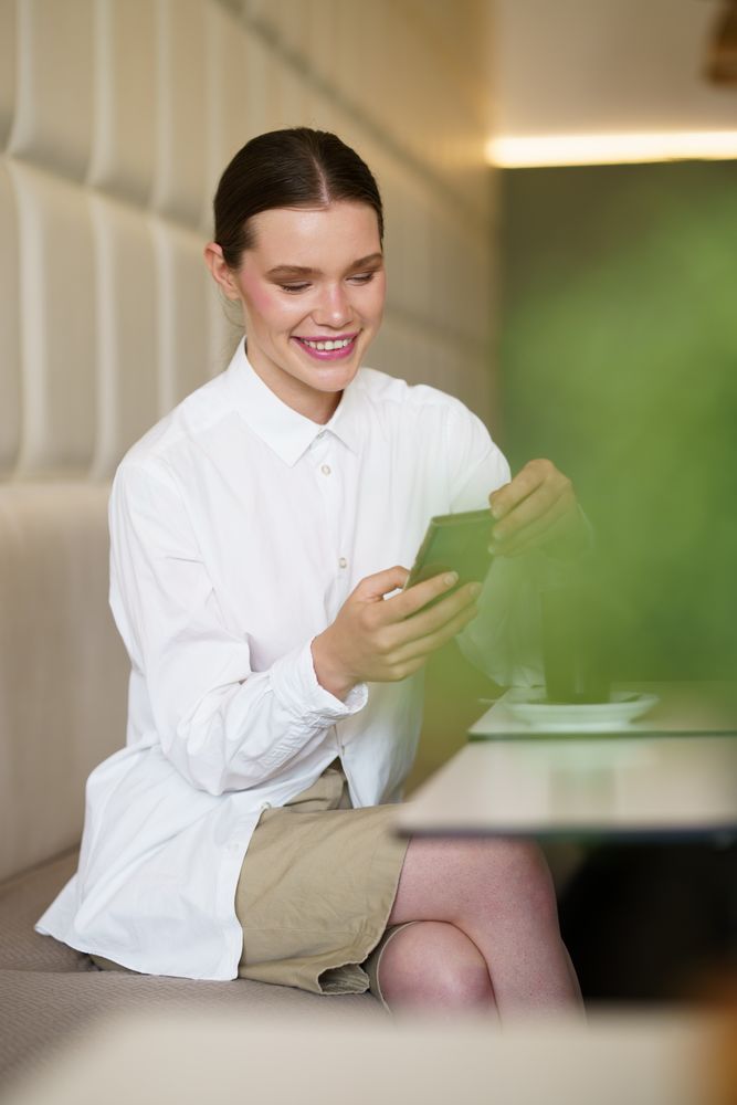 Smiling woman sitting in cafe