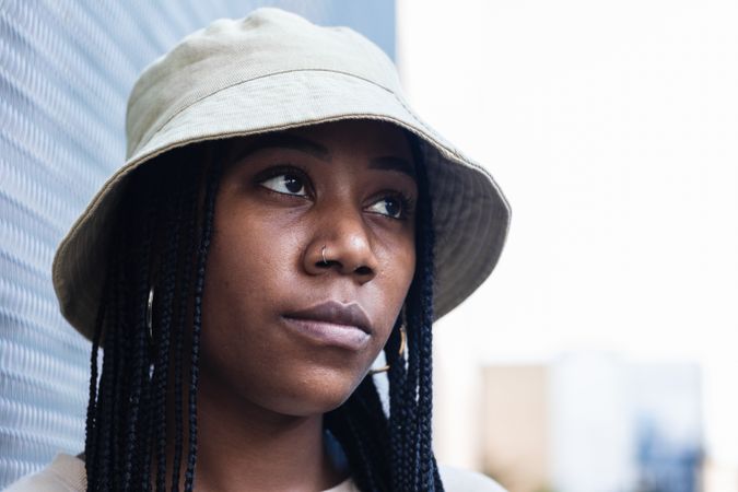 Young Black woman in hat