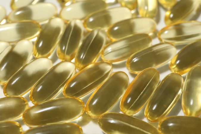 Omega pills close-up on a light background