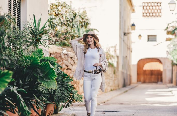Tourist woman walking on the street
