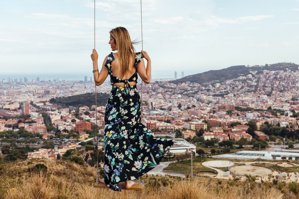Female from behind on a swing