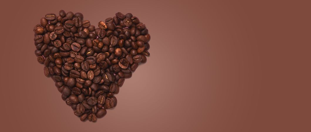 Coffee heart banner on warm brown background