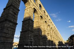 View of the famous Aqueduct of Segovia with mid day shadow 5aXWEW