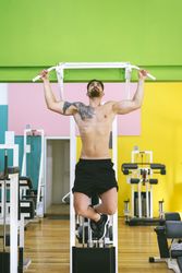 Front of man working out in a fitness club