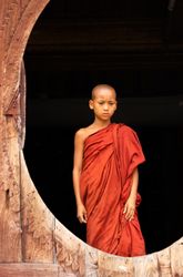 Mandalay, Myanmar - June, 25 2012: Monk boy in monastery