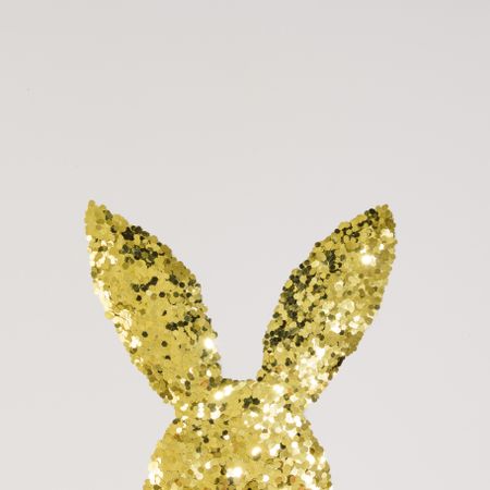 Easter bunny rabbit made of gold glitter