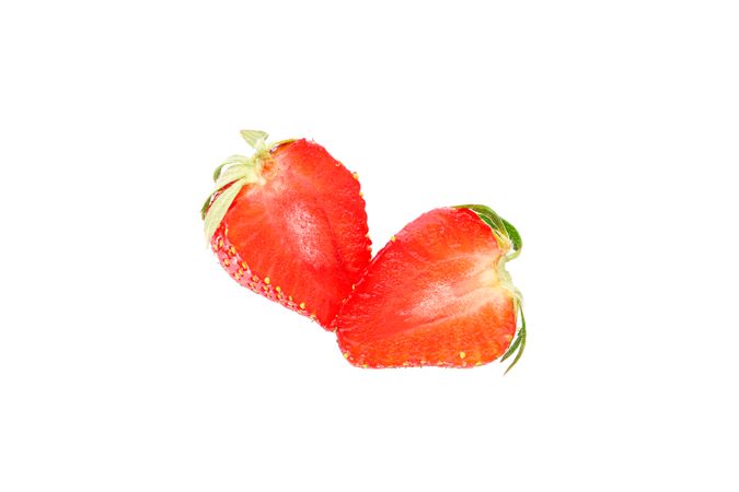 Strawberries isolated on light background. Summer sweet fruits and berries