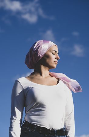 Young woman with cancer bandana