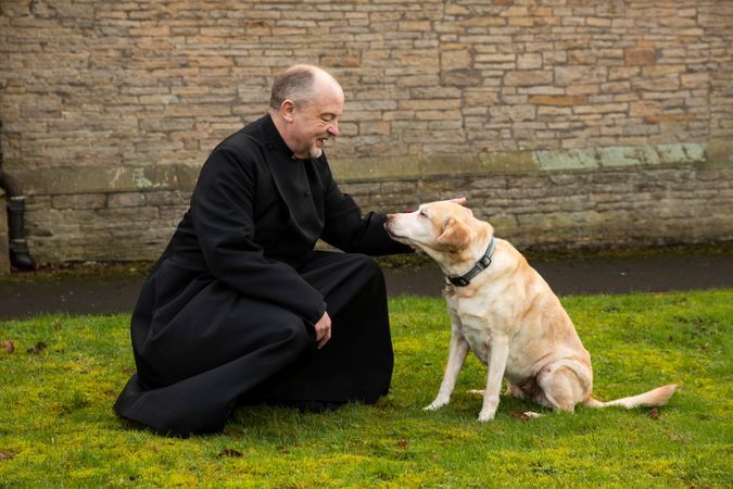 Vicar with dog