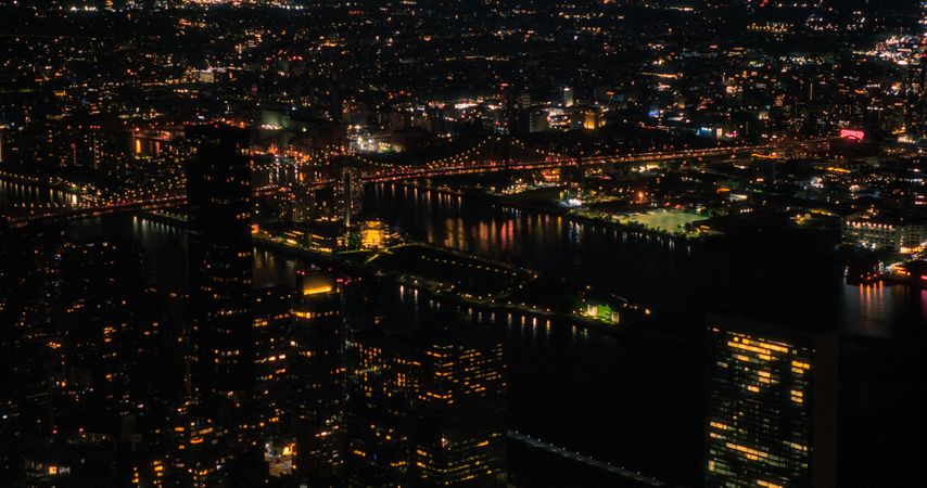 Lower Manhattan Bird's Eye Tour of New York City, United States. Aerial Urban Scenery From a Helicopter. Big Apple Office Buildings and Skyscrapers at Night