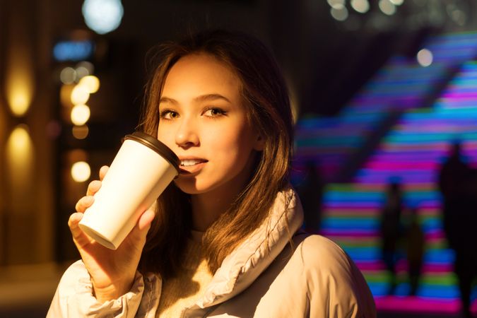 Woman enjoying nightlife in city