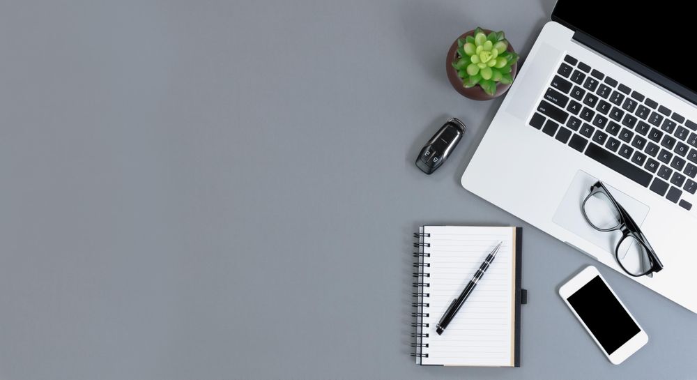 Top view of gray desk with amply copy space