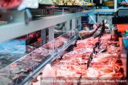 Meat on display behind counter at butchers 5zArj0