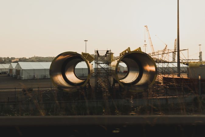 New metal pipes locating on industrial ground