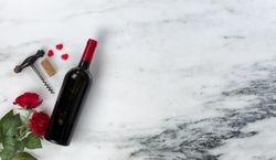 Valentine’s Day love with red wine and small hearts