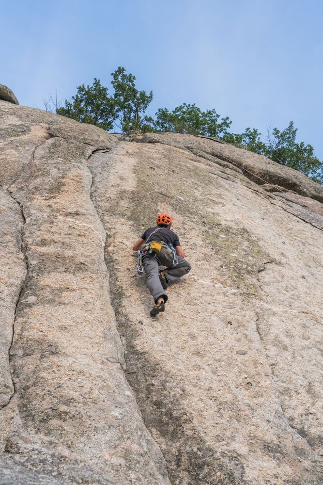 Man climbing a rock