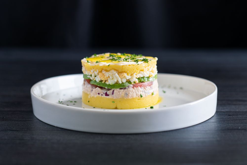 Fresh aromatic Lima cause of tuna with sliced vegetables