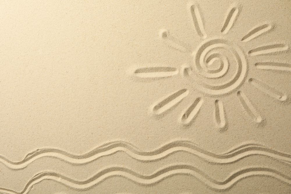 Picture of sun and waves on sea sand background