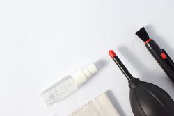 Top view of lens cleaning kit with copy space