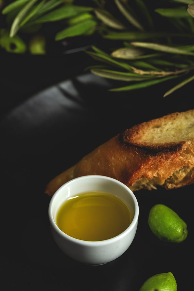 Fresh Spanish extra virgin olive oil with olives