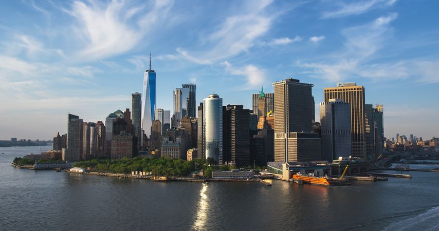 Scenic Aerial New York City View of Lower Manhattan Architecture. Panoramic Wall Street Financial District Photo from a Helicopter. Cityscape with Office Buildings and Skyscrapers Near East River