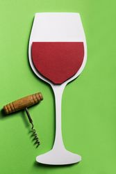 Silhouette of a glass of red wine made with cardboard