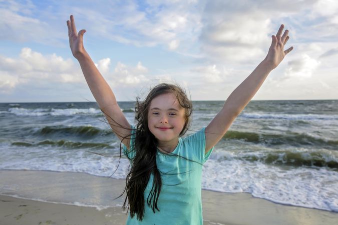 Playful girl having fun at the beach
