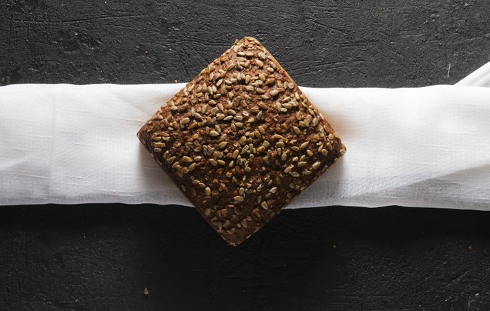 Loaf of bread with grains and poppy seeds