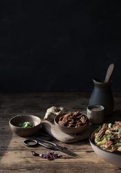 Miso noodles with egg plants and shiitake on wooden table