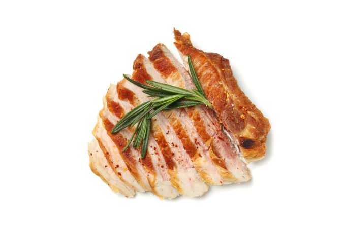 Chopped pork steak isolated on blank background. Grilled food