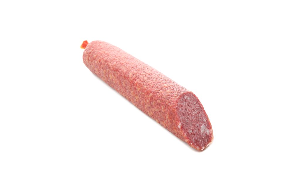 Salami stick in plain room