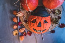 Halloween scene with marijuana paraphernalia and leaves