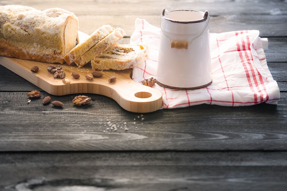 Sliced pound cake on wooden table