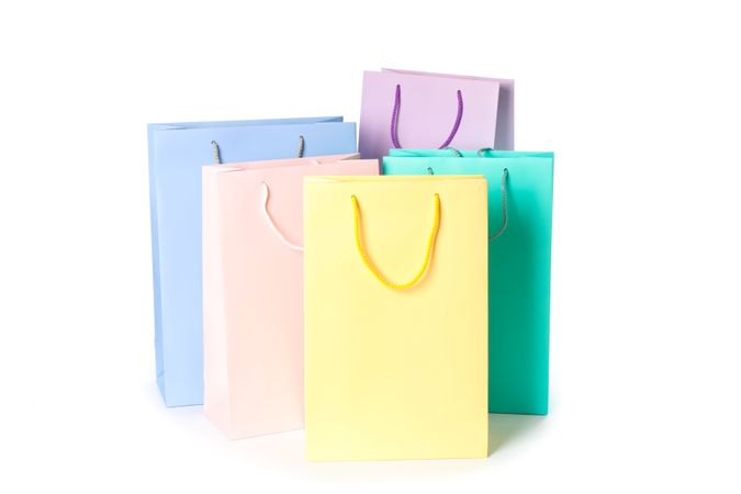 Multicolor paper bags isolated on blank background