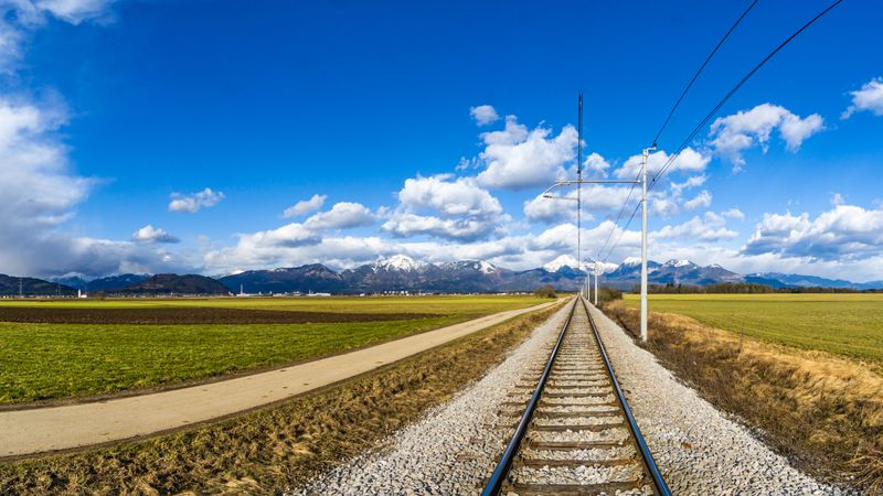 Train rail under blue sky