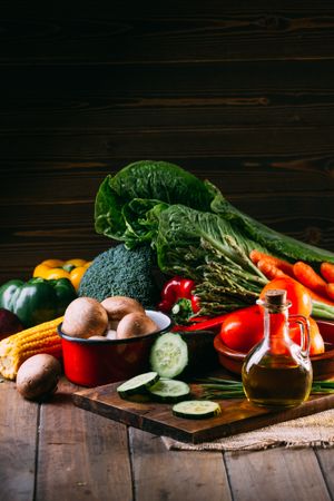 Vegetables and utensils on kitchen table