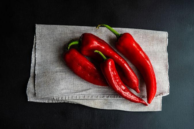 Fresh red peppers drying on napkin