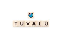 Wooden blocks bearing the name and flag of Tuvalu.