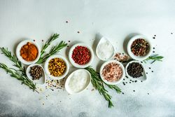 Spices in bowls on kitchen counter