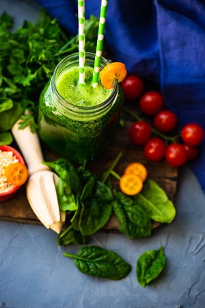 Green smoothie of apple, baby spinach, cucumber, chia seeds