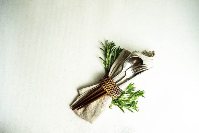 Minimalistic table setting with rosemary