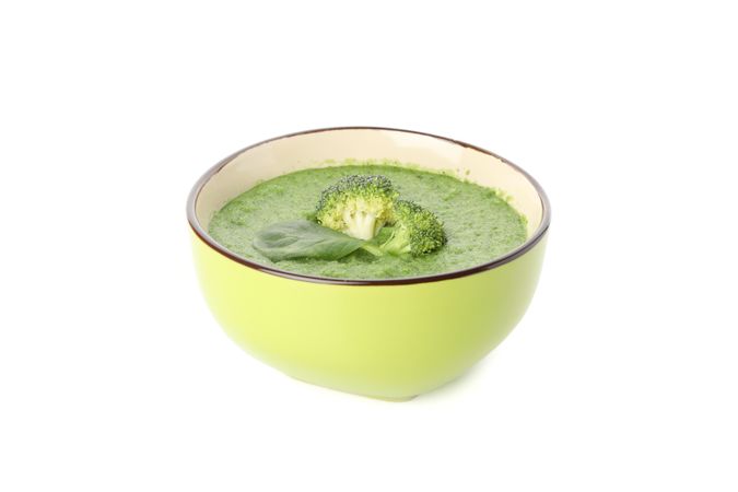 Side view of green broccoli soup