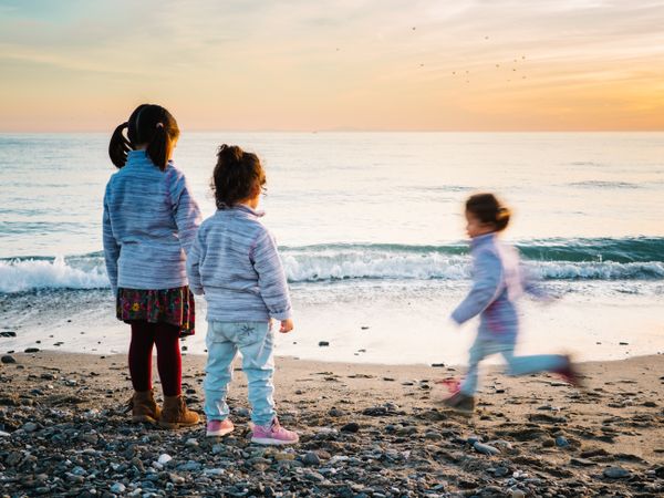 kids playing at the beach