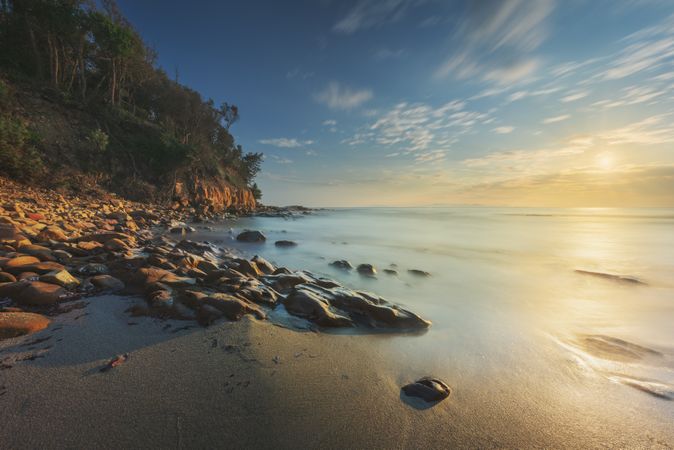 Cala Violina beach in Maremma at sunset, Tuscany