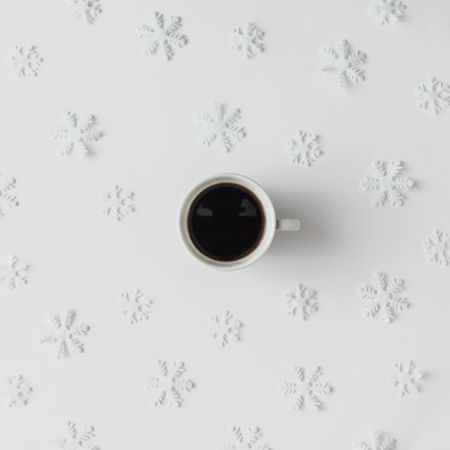 Coffee cup with winter light light background