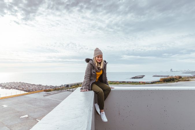 Portrait of blonde woman posing in the city
